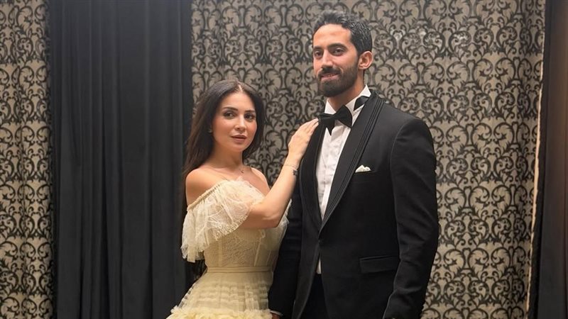 مي عز الدين وزوجها