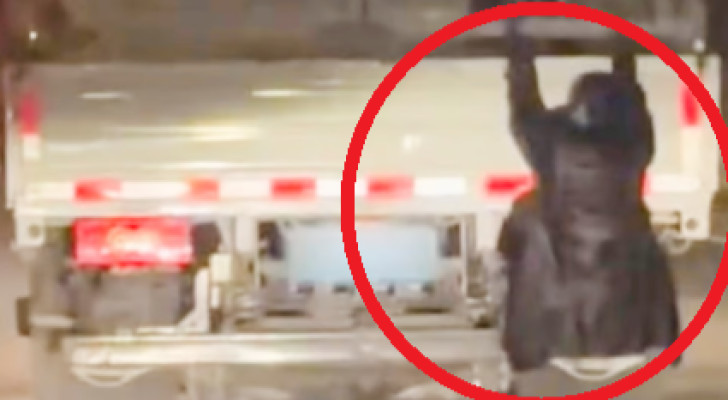 زوجة تتعلق بشاحنة زوجها المتحركة للتأكد من أنه لا يخونها!